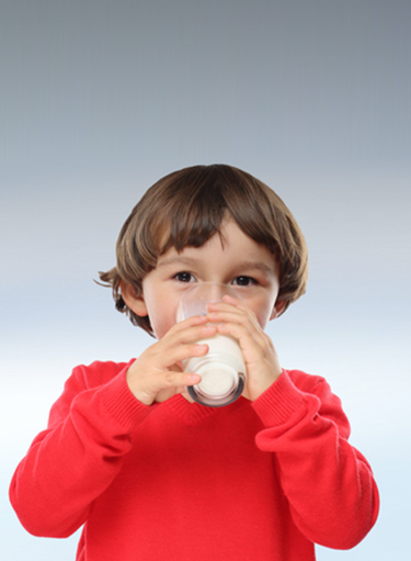 Kid Drinking Milk - Nestle