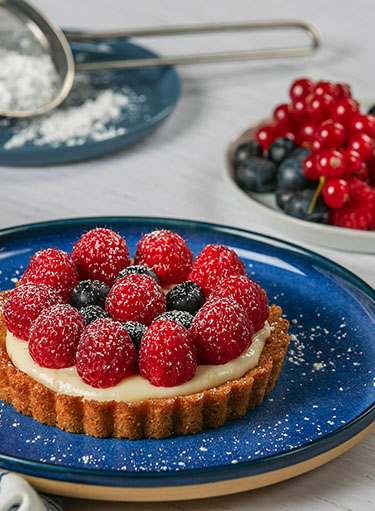 small tart topped with berries small