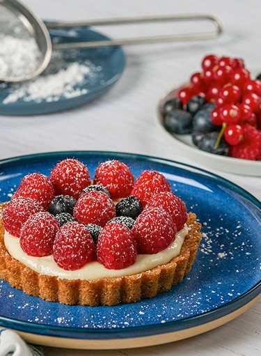 small tart topped with berries small