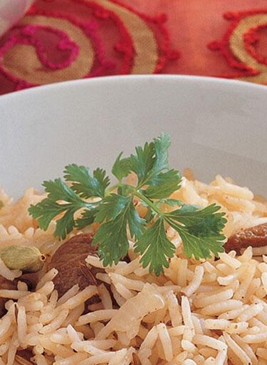 أرز بالكراويا مع لحم الغنم