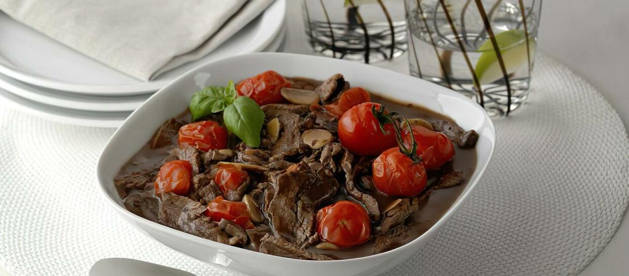 Pan Fried Beef Strips with Roasted Cherry Tomato Spanish Style