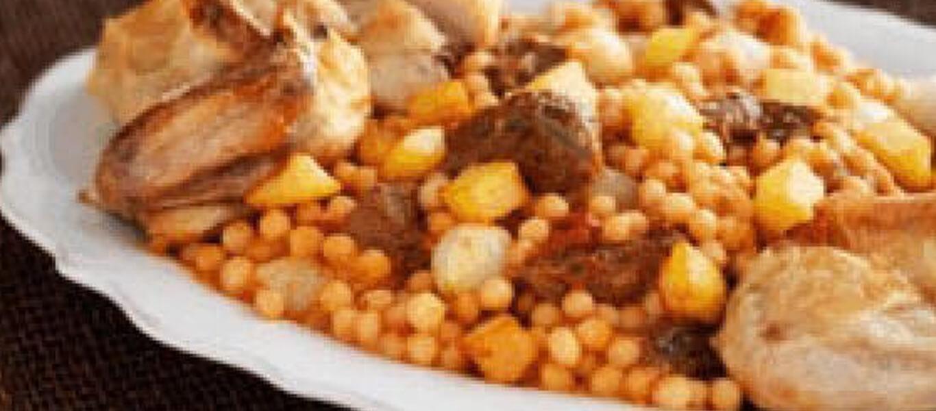 مغربيّة مع البطاطا بصلصة الطماطم