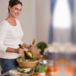 Woman making salad